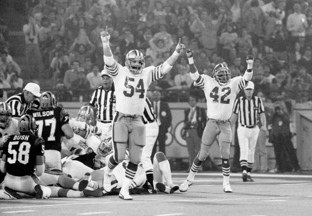 San Francisco 49ers celebrate their third quarter goal line stance that  stopped a Cincinnati Bengals scoring threat from within the one-yard-line,  on a fourth down situation, during Super Bowl XVI in Pontiac