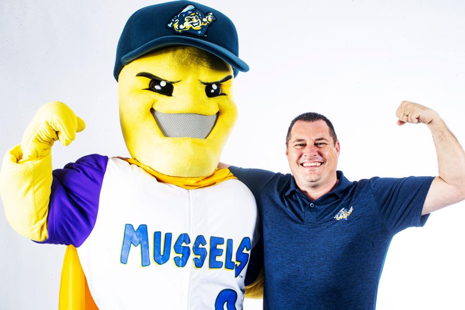 John Martin, the majority owner of the Mighty Mussels minor league baseball team with the  Mighty Mussels mascot.  
