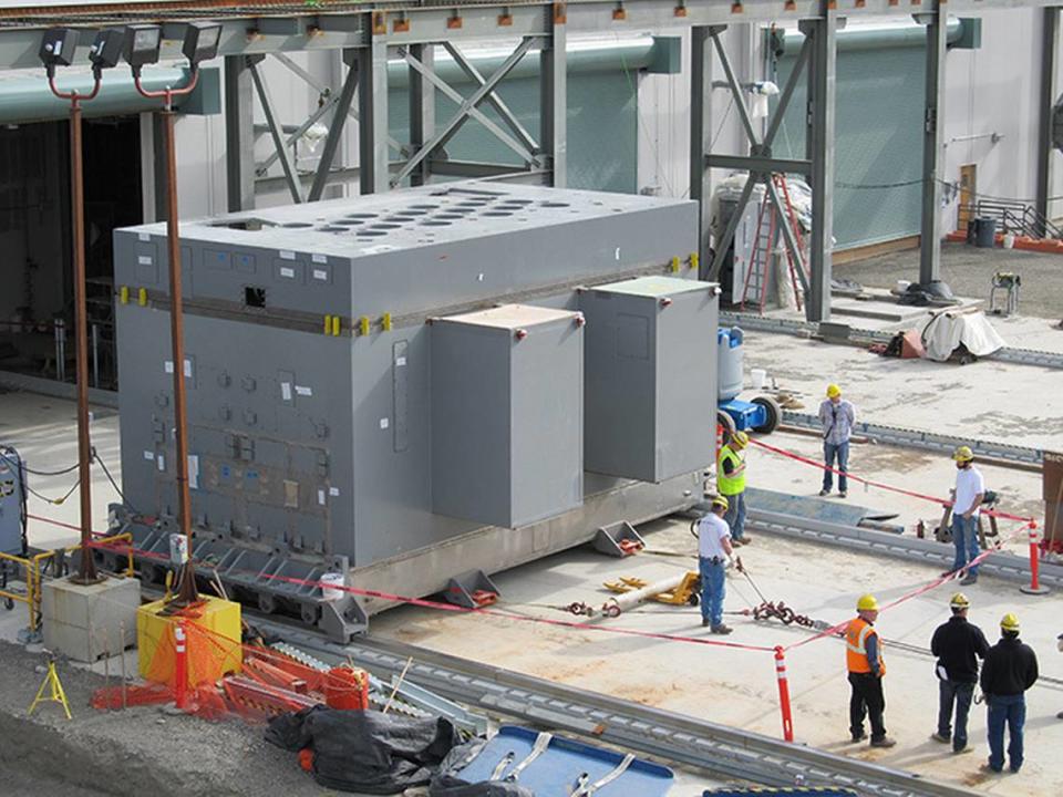 Crews pull a melter from the Hanford nuclear reservation’s vitrification plant for inspection during construction of the plant.