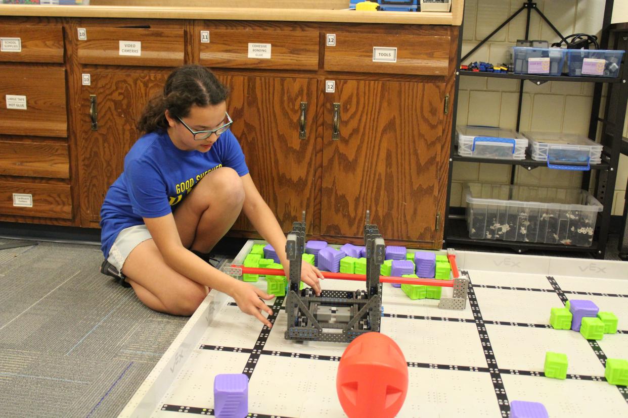 Ava Costine looks at where the robot needs to go on the practice field on Monday, April 15, 2024 at Good Shepherd Lutheran School.
