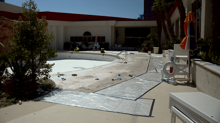 Workers redesigning one of four hotel pools at The Rio Thursday. (KLAS)