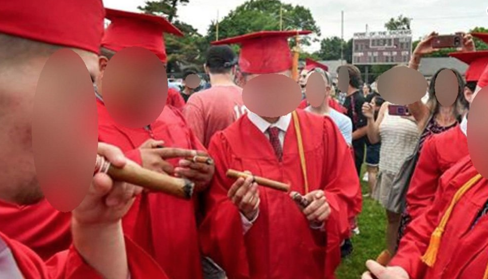 Seven players were suspended from postseason play after smoking cigars at Saugus High graduation. (via @wbz on Twitter)