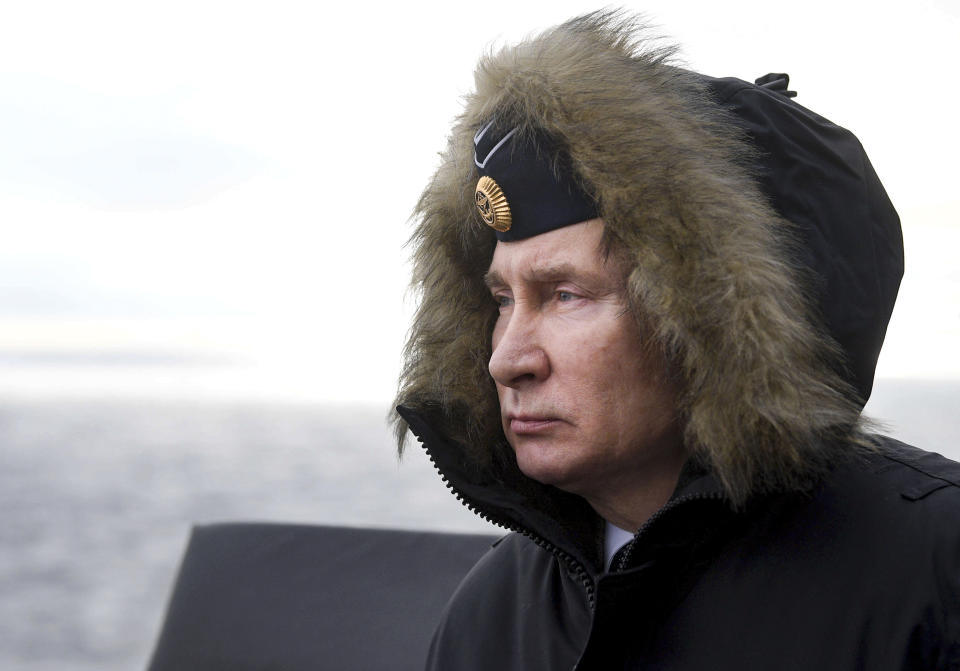 Russian President Vladimir Putin watches a navy exercise from the Marshal Ustinov missile cruiser in the Black Sea in , Crimea, Thursday, Jan. 9, 2020. The drills involved warships and aircraft that launched missiles at practice targets. (Alexei Druzhinin, Sputnik, Kremlin Pool Photo via AP)