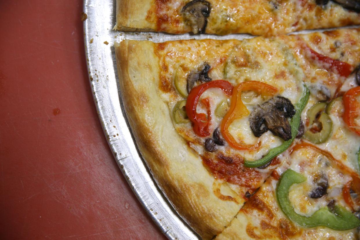 A veggie pizza is pictured Tuesday, March 26, 2024 at Graze Gourmet To Go in Iowa City, Iowa.