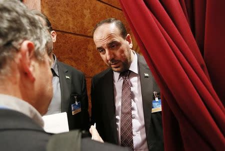 Head of the Syrian High Negotiations Committee (HNC) opposition group Nasr al-Hariri leaves after his address to the media aside of the Intra-Syria peace talks in Geneva, Switzerland, February 25, 2017. REUTERS/Pierre Albouy