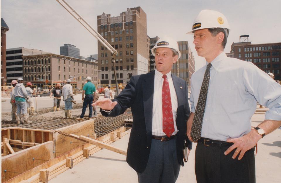 Former Indianapolis Mayor Stephen Goldsmith (right) is pictured here getting a close look at the parking structure under construction at Circle Centre Mall in April 1993. Terry Greene, vice president of DeMars Program Management, explained the garage features to the then-mayor. Goldsmith served two terms as Indianapolis from 1992-2000. (Photo taken April 28, 1993)