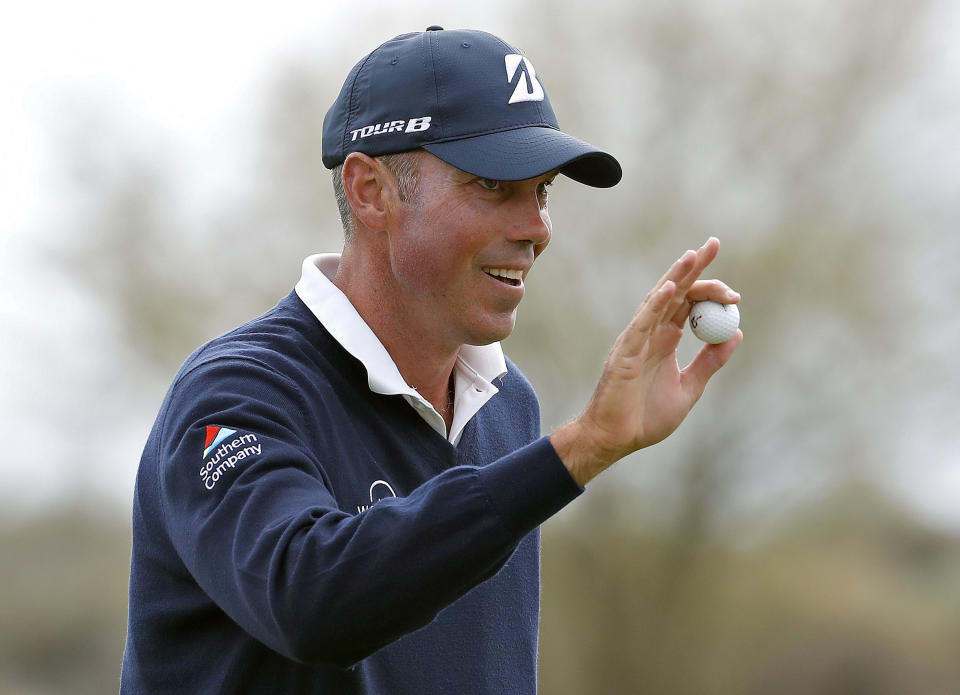 Matt Kuchar waves after making his birdie putt on the 12th green during the third round of the Phoenix Open PGA golf tournament, Saturday, Feb. 2, 2019, in Scottsdale, Ariz. (AP Photo/Matt York)