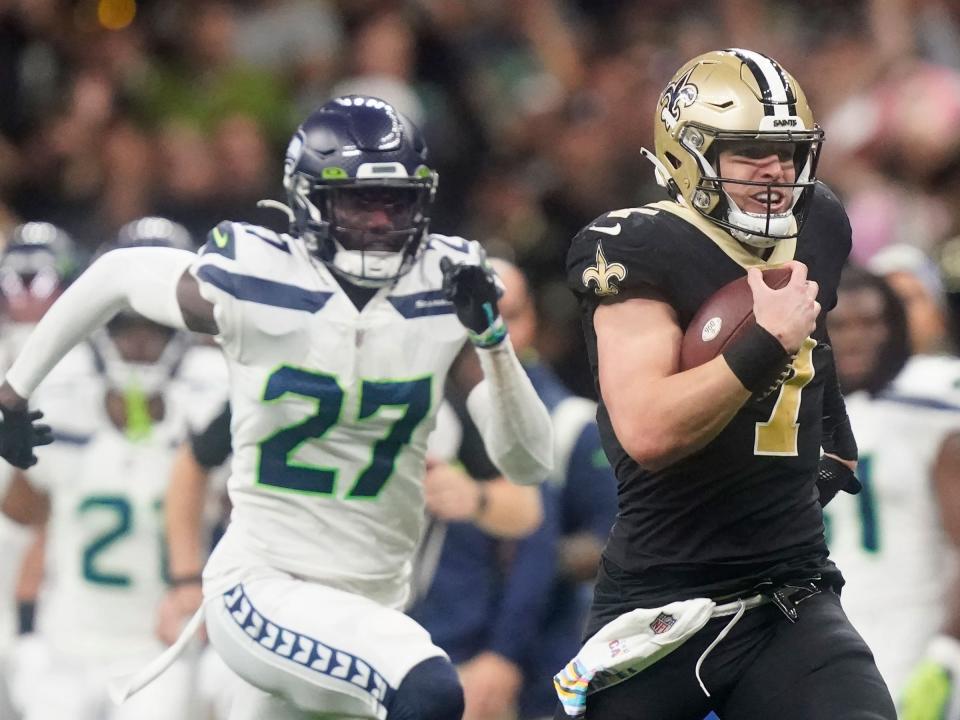 Taysom Hill runs for a touchdown against the Seattle Seahawks.