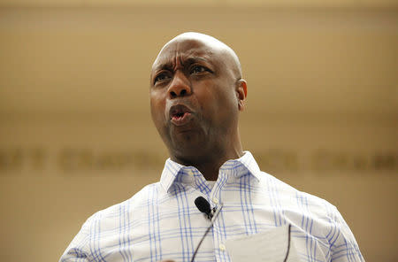 U.S. Senator Tim Scott (R-SC) reacts to a harsh statement from an audience member at a town hall meeting for constituents in North Charleston, South Carolina, U.S. February 25, 2017. REUTERS/Randall Hill