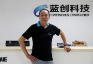 Li Libo, CEO of Lanchuang Network Technology Corp, poses for a photo after an interview at his company's headquarters in Weifang