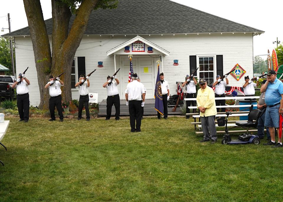 Honor Guard members fire a 21-gun salute during the annual veterans program Wednesday at the Lenawee County Fair.