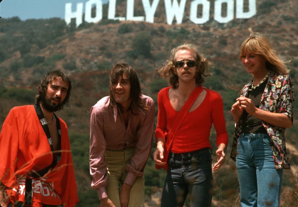 <p>We're thinking everyone started taking their photos here after seeing just how cool Fleetwood Mac looked posing near the Hollywood sign. </p>