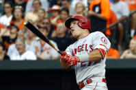 FILE - In this Aug. 19, 2017, file photo, Los Angeles Angels' Mike Trout watches his solo home run in the first inning of a baseball game against the Baltimore Orioles in Baltimore. A person familiar with the negotiations tells The Associated Press Tuesday, March 19, 2019, that Trout and the Angels are close to finalizing a record $432 million, 12-year contract that would shatter the record for the largest deal in North American sports history. (AP Photo/Patrick Semansky, File)