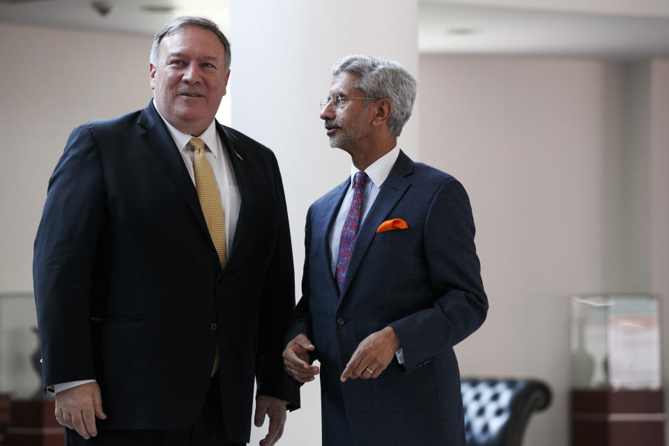 U.S. Secretary of State Mike Pompeo listens to Indian Foreign Minister Subrahmanyam Jaishankar as he arrives for their meeting at the Foreign Ministry in New Delhi, India, Wednesday, June 26, 2019. Pompeo held meetings in India's capital on Wednesday amid growing tensions over trade and tariffs that has strained the partners' ties. (AP Photo/Jacquelyn Martin, Pool)