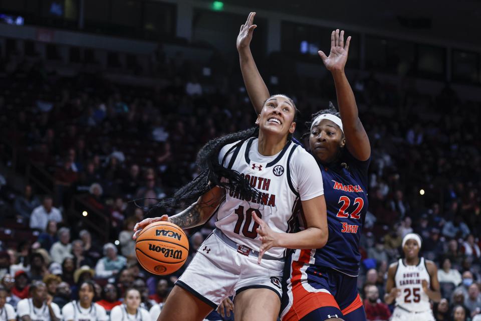 South Carolina center Kamilla Cardoso (10) drives to the basket against Morgan State center Jael Butler during the second half of an NCAA college basketball game in Columbia, S.C., Wednesday, Dec. 6, 2023. | Nell Redmond, Associated Press