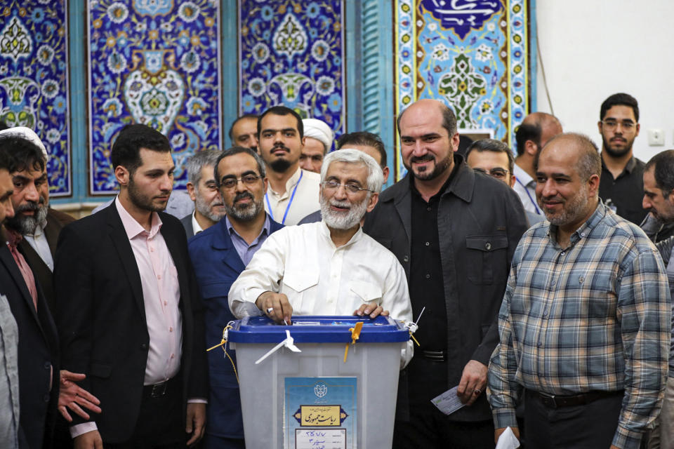 In this photo provided by Iranian Students' News Agency, ISNA, hard-line former Iranian senior nuclear negotiator and candidate for the presidential election Saeed Jalili casts his ballot in a polling station, in Tehran, Iran, Friday, June 28, 2024. Iranians are voting in a snap election to replace the late hard-line President Ebrahim Raisi. (Alireza Sotakabr, ISNA via AP)