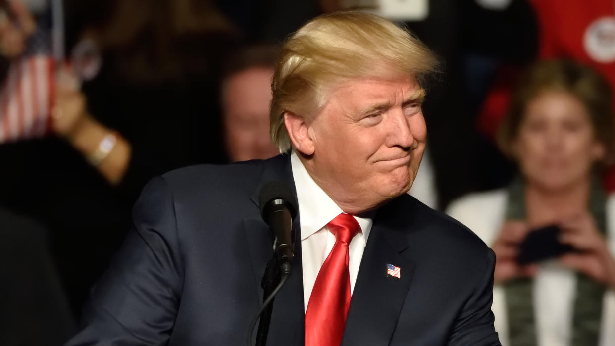 HERSHEY, PA - DECEMBER 15, 2016: President-Elect Donald Trump looks left toward the crowd as he delivers a speech at a "Thank You Tour" rally held at the Giant Center.