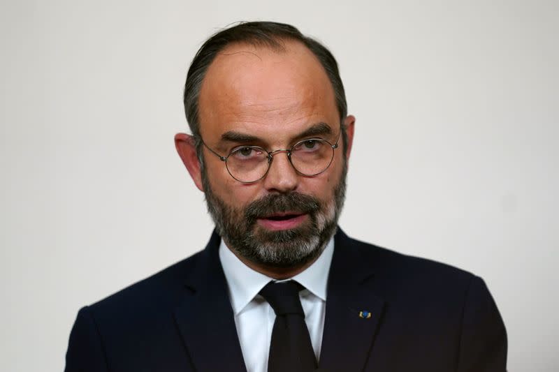 French PM Philippe speaks to media after meeting with labour union representatives at Hotel de Matignon in Paris