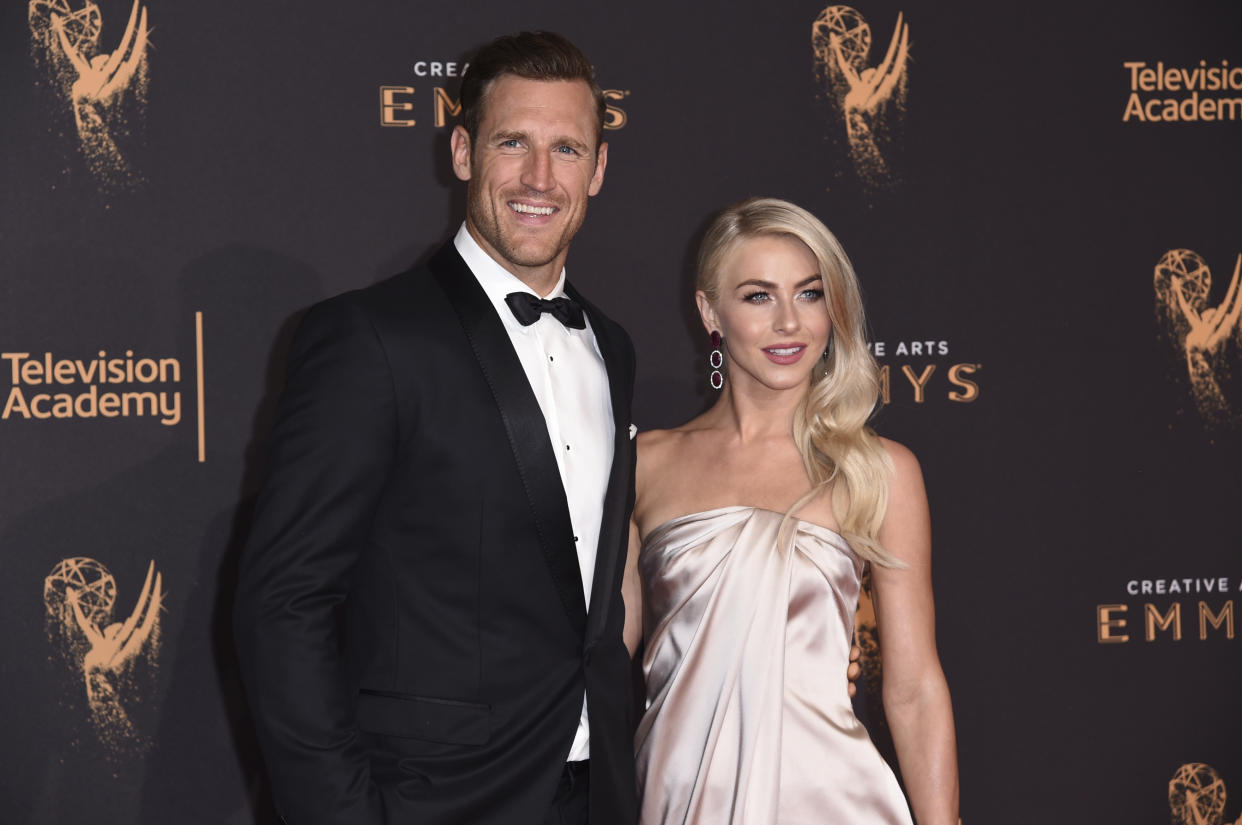 Brooks Laich, left, and Julianne Hough arrive at night one of the Creative Arts Emmy Awards at the Microsoft Theater on Saturday, Sept. 9, 2017, in Los Angeles. (Photo by Richard Shotwell/Invision/AP)