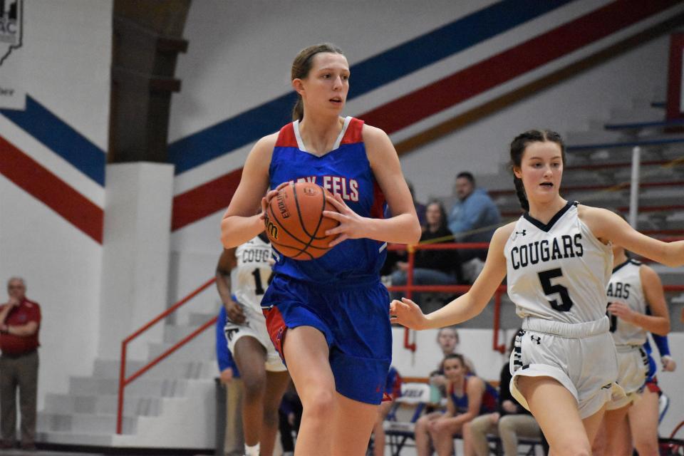 Eminence's Sophia Saucerman runs the fast break during the Eels' sectional championship matchup with Greenwood Christian on Feb. 4, 2023.