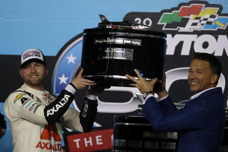 Feb 19, 2024; Daytona Beach, Florida, USA; NASCAR Cup Series driver William Byron (24) poses with the Daytona 500 trophy at Daytona International Speedway. Mandatory Credit: Peter Casey-USA TODAY Sports Peter Casey/Peter Casey-USA TODAY Sports