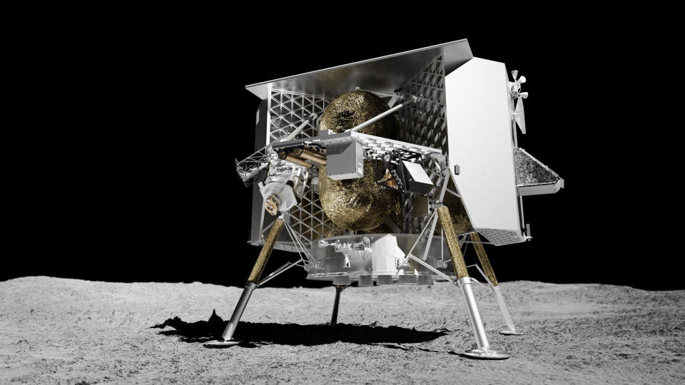 four-pronged lander probe with an open-faced metal body, containing two stacked, gold-foil spherical fuel tanks.  The probe stands on the dusty gray surface of the moon, lit from above, with a background of black space.