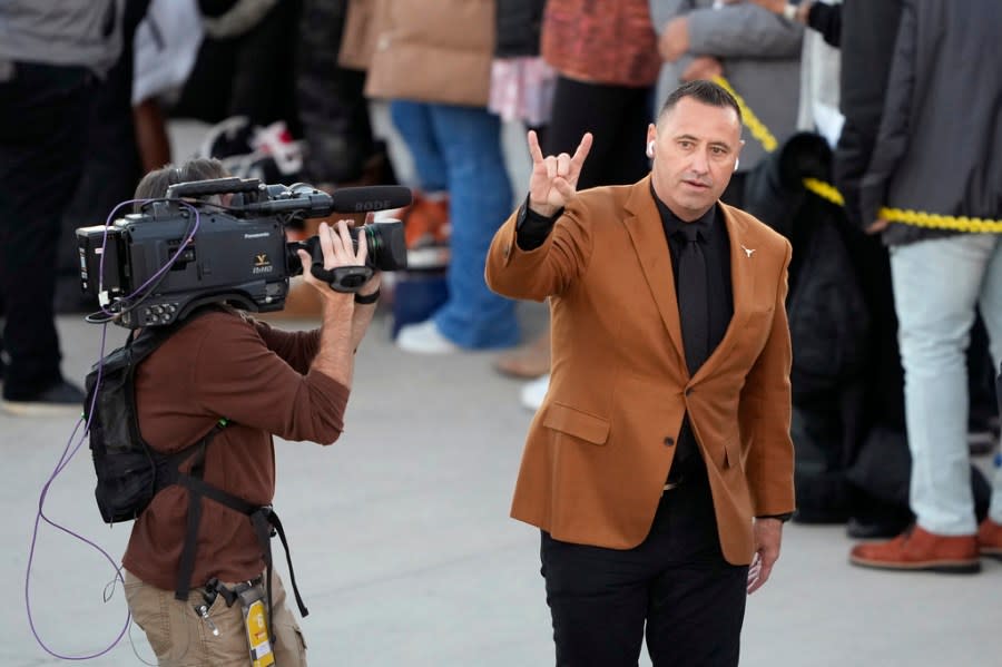 Texas head coach Steve Sarkisian arrives at Jack Trice Stadium before an NCAA college football game against Iowa State, Saturday, Nov. 18, 2023, in Ames, Iowa. (AP Photo/Matthew Putney)