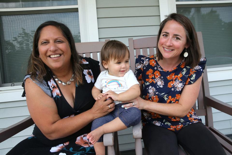 Priya Greene, left, had rare, almost deadly reaction to IVF treatment and her neighbor, Libby Vardaro became her surrogate to bring Riya into the world.