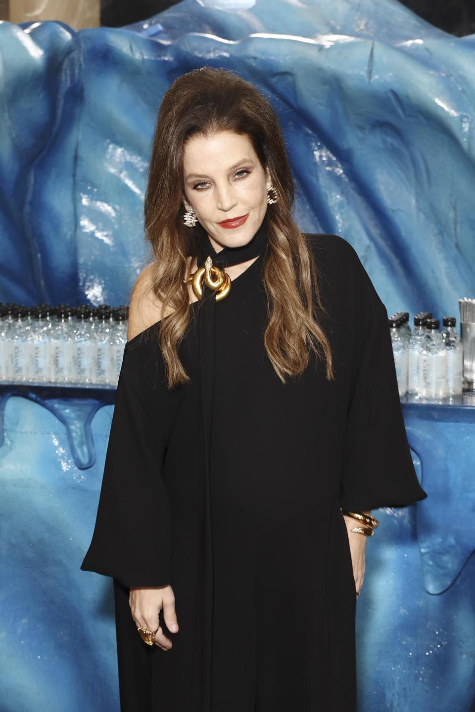 BEVERLY HILLS, CALIFORNIA - JANUARY 10: Lisa Marie Presley with Icelandic Glacial at the 80th Annual Golden Globe Awards at The Beverly Hilton on January 10, 2023 in Beverly Hills, California. (Photo by Joe Scarnici/Getty Images for Icelandic Glacial)