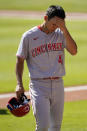 Cincinnati Reds' Shogo Akiyama of Japan, heads to the dugout after grounding out during the eighth inning against the Atlanta Braves in Game 2 of a National League wild-card baseball series, Thursday, Oct. 1, 2020, in Atlanta. (AP Photo/John Bazemore)