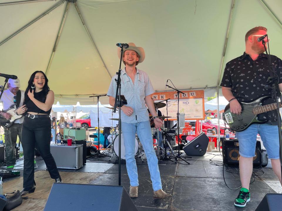 The John Stone Band from Nashville plays country tunes at the Southern Tequila and Taco Fest to benefit Remote Area Medical at Mayor Ralph McGill Plaza on April 28, 2023.