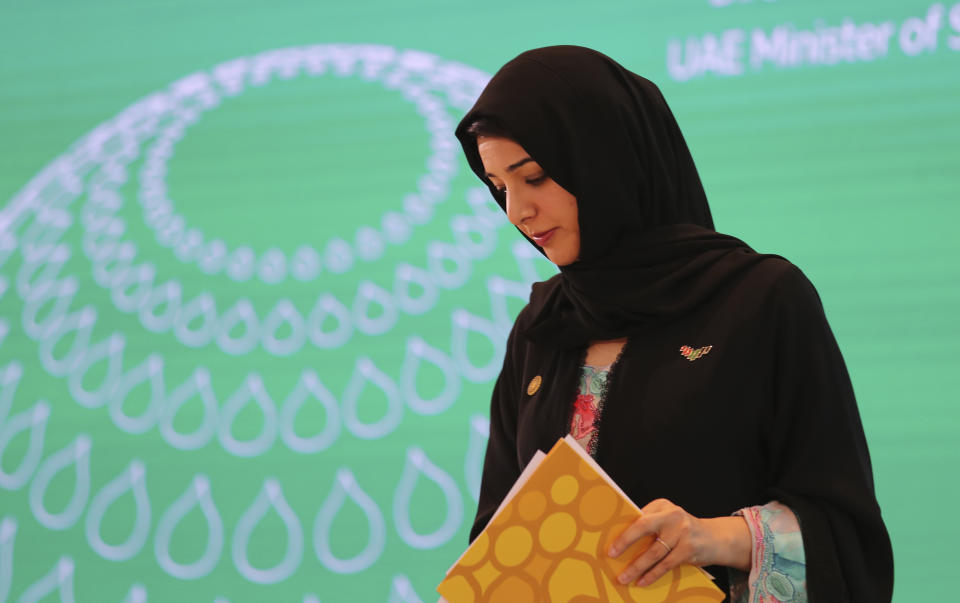 Reem Ebrahim Al-Hashimi, Emirati Minister of State and Managing Director for the Dubai World Expo, leaves the stage after her speech during a media tour to visit Terra, The Sustainability Pavilion at the Dubai World Expo site in Dubai, United Arab Emirates, Saturday, Jan. 16, 2021. With the inauguration of Expo 2020 Dubai, the next world's fair, nine months away amid the raging global pandemic that forced its postponement, organizers unveiled the site's signature pavilion to reporters for the first time on Saturday. (AP Photo/Kamran Jebreili)