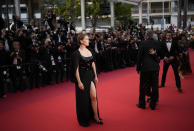 Lea Seydoux poses for photographers upon arrival at the 75th anniversary celebration of the Cannes film festival and the premiere of the film 'The Innocent' at the 75th international film festival, Cannes, southern France, Tuesday, May 24, 2022. (AP Photo/Daniel Cole)