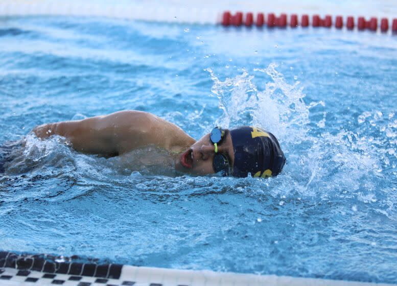 St. Monica High's Mateo Escovar, who has cerebral palsy, swam in the first-ever adaptive heat at Southern Section prelims.