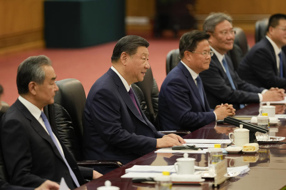 Chinese President Xi Jinping, second from left, and his delegation including Foreign Minister Wang Yi, far left, attend a meeting with Bangladesh Prime Minister Sheikh Hasina at the Great Hall of the People in Beijing, China, Wednesday, July 10, 2024. (AP Photo/Vincent Thian, Pool)