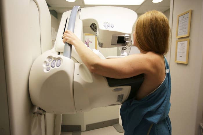 A woman gets a mammogram at the University of Michigan Cancer Center.