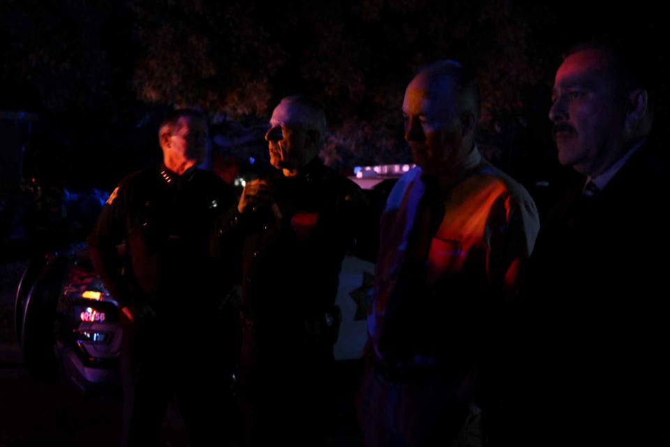 Police personnel stand outside the scene of a shooting at a backyard party, Sunday, Nov. 17, 2019, in southeast Fresno, Calif. (Photo: Larry Valenzuela/The Fresno Bee via AP)