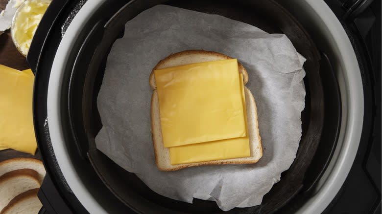 bread with cheese in basket