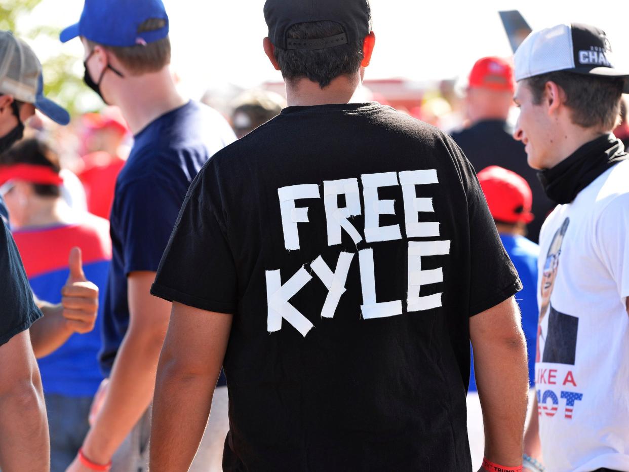 A man wears a shirt calling for freedom for Kyle Rittenhouse, 17, the man who allegedly shot protesters in Wisconsin, during a US President Donald Trump Campaign Rally, the day after the end of the Republican National Convention, at Manchester airport in Londonderry, New Hampshire, on August 28.