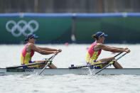 Ancuta Bodnar and Simona Radis of Romania compete in the women's rowing double sculls final at the 2020 Summer Olympics, Wednesday, July 28, 2021, in Tokyo, Japan. (AP Photo/Lee Jin-man)