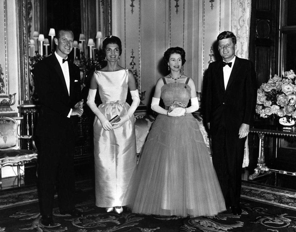 Queen Elizabeth II and Prince Philip in full evening dress with President John Kennedy and Jacqueline Kennedy.