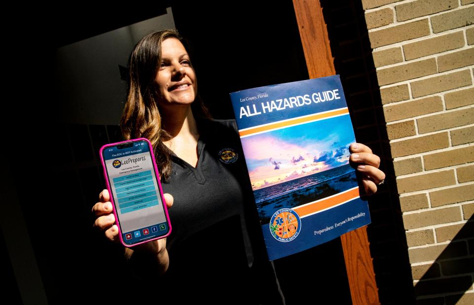 Sandra Tapfumaneyi, the Director of Public Safety-Emergency Management in Lee County displays resources that can be used in preparation of a disaster including a hurricane. 