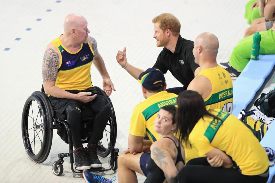 Prince Harry speaks to athletes during a training session at the Toronto Pan Am Sports Centre (PA)