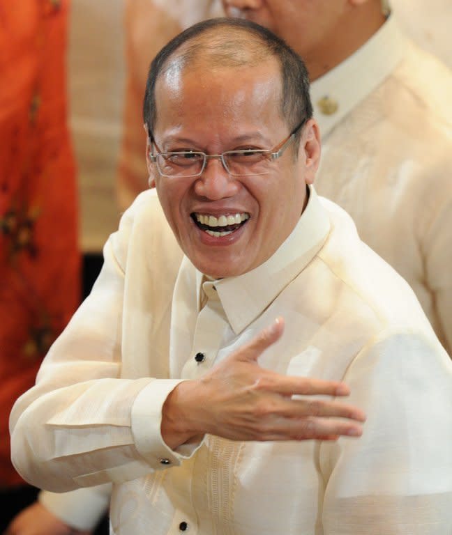 Philippine President Benigno Aquino, pictured after delivering his forth annual State of the Nation address before the annual joint session of Congress, in Manila, on July 22, 2013. Japan's Prime Minister Shinzo Abe is to meet Aquino on Saturday as the Philippines seeks to boost cooperation over growing territorial disputes with regional rival China