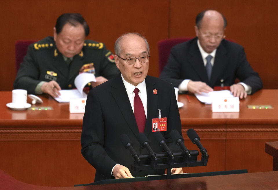 Zhang Jun, president of the Supreme People's Court, delivers a speech during the second plenary session meeting of the National People's Congress (NPC) in the Great Hall of the People in Beijing, China, Friday, March 8, 2024. (AP Photo/Tatan Syuflana)