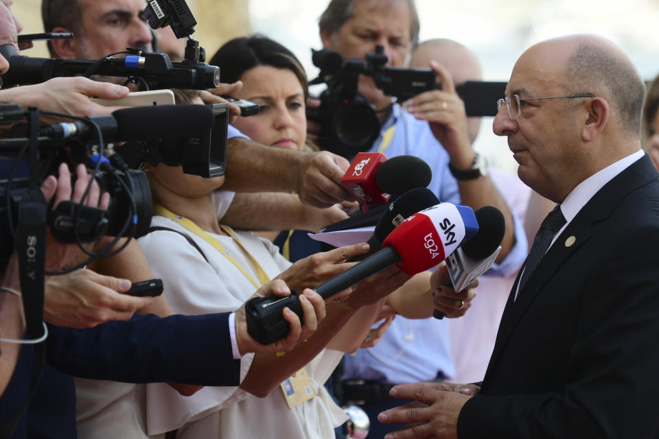 Malta's National Security Minister Michael Farrugia arrives on the occasion of an informal meeting of EU interior ministers in Valetta, Malta, Monday, Sept. 23, 2019. The interior ministers from Italy, Malta, France and Germany were meeting in Malta on Monday to develop some automatic mechanism to assure that those rescued at sea will be distributed among other countries and not be the responsibility of the nations where they land. (AP Photo/Jonathan Borg)