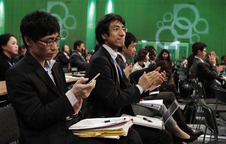 Delegates attend the closing session of the 19th conference of the United Nations Framework Convention on Climate Change (COP19) in Warsaw November 22, 2013. REUTERS/Kacper Pempel