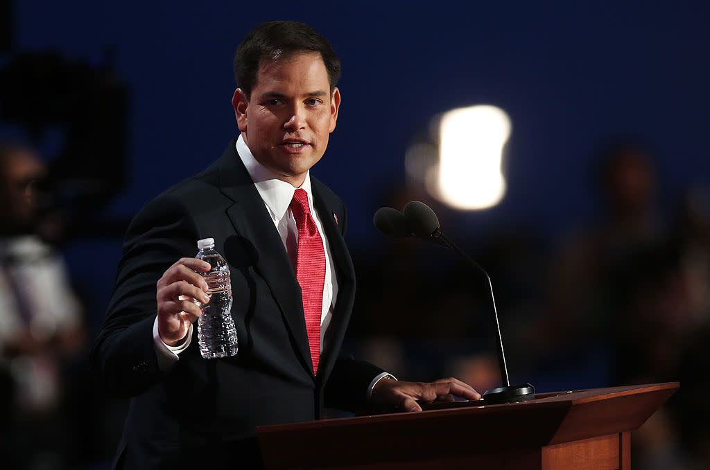 Senator Marco Rubio (FL) holds the water that Clint Eastwood drank from as he speaks during the final day of the Republican National Convention