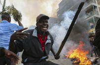 <p>Residents of the Mathare area of Nairobi, Kenya, take to the streets by blocking roads with burning tyres to protest in support of Kenyan opposition leader and presidential candidate Raila Odinga, Wednesday Aug. 9, 2017. (Photo: Brian Inganga/AP) </p>