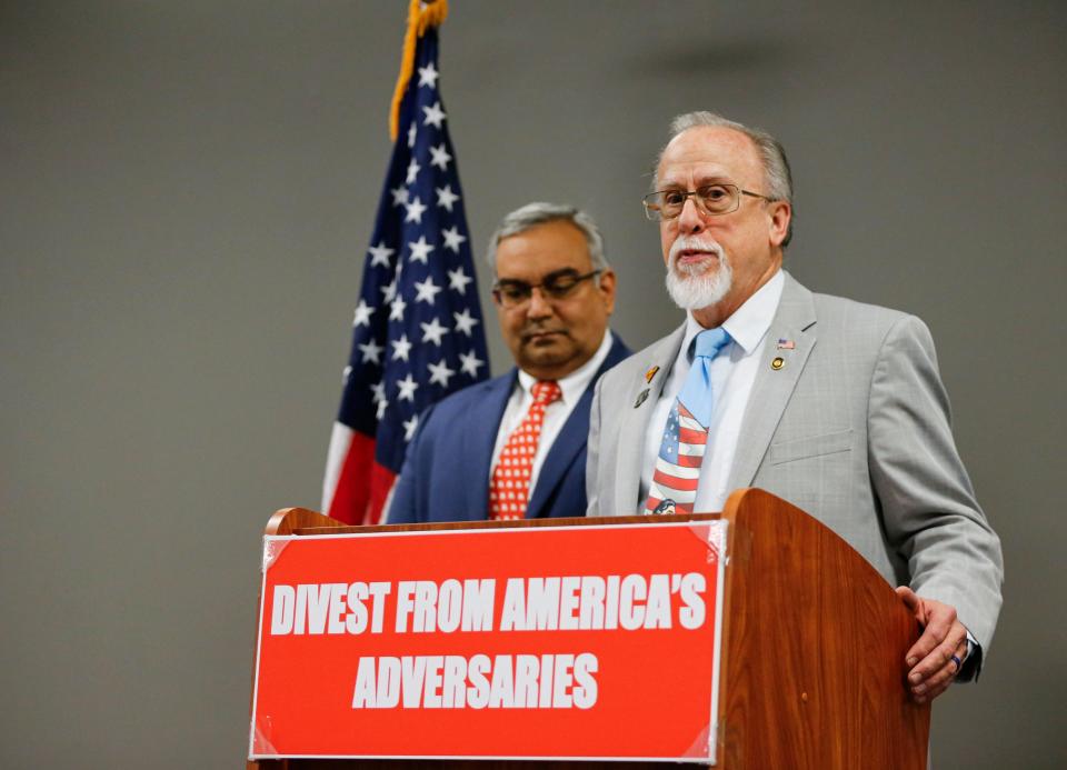 Missouri State Treasurer Vivek Malek and Branson Rep. Brian Seitz speak Thursday afternoon at the Greene County Elections Center in Springfield about Seitz'z bill to require public investments, like pensions and public endowments, to divest from countries that the U.S. has sanctioned or has classified as adversaries.